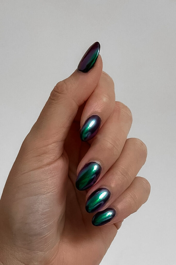 girl with Forest Green Chrome Nails for fall