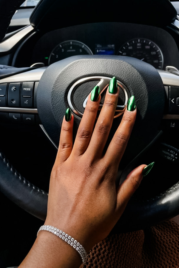 girl with Forest Green Chrome Nails for fall