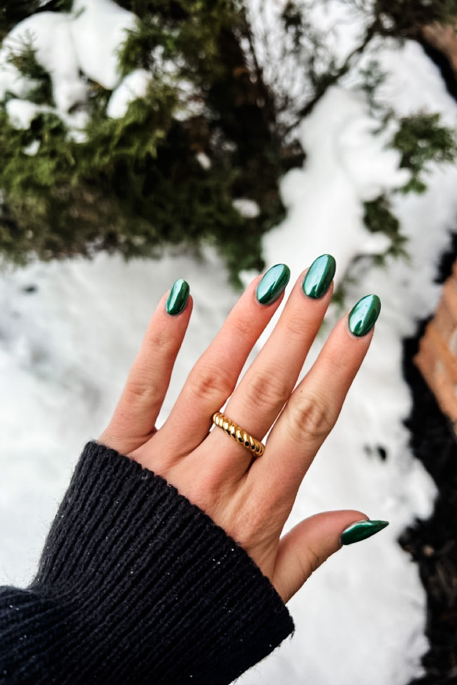 girl with Forest Green Chrome Nails for fall