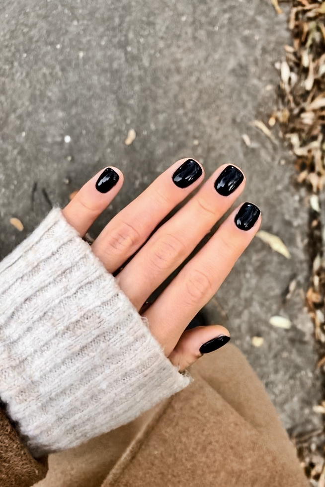 woman with short black nails for fall