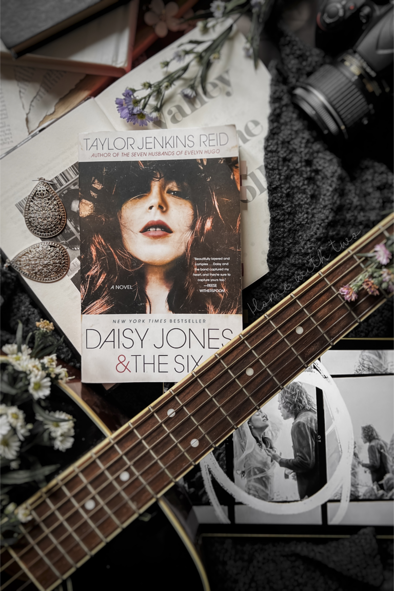 book flatlay of the book cover of Daisy Jones and the Six and Daisy with Billy from the Amazon series Daisy Jones and the Six